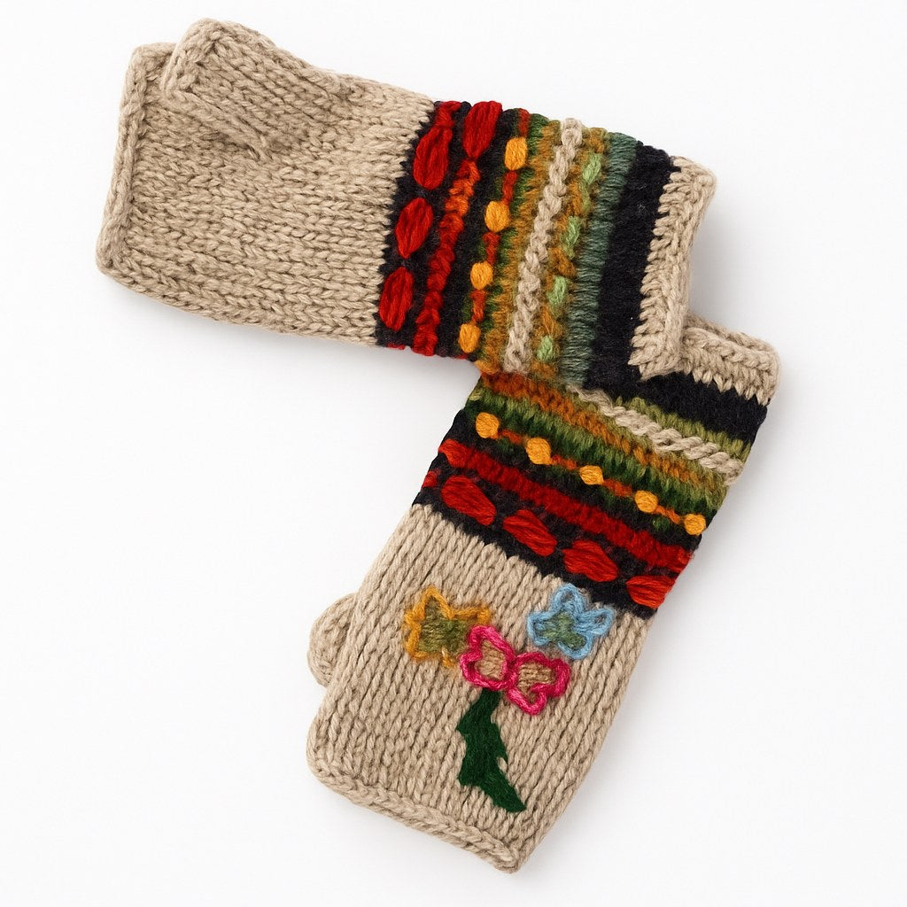 A pair of beige knit fingerless gloves with colorful striped and floral patterns on the cuffs, displayed on a clean white background.